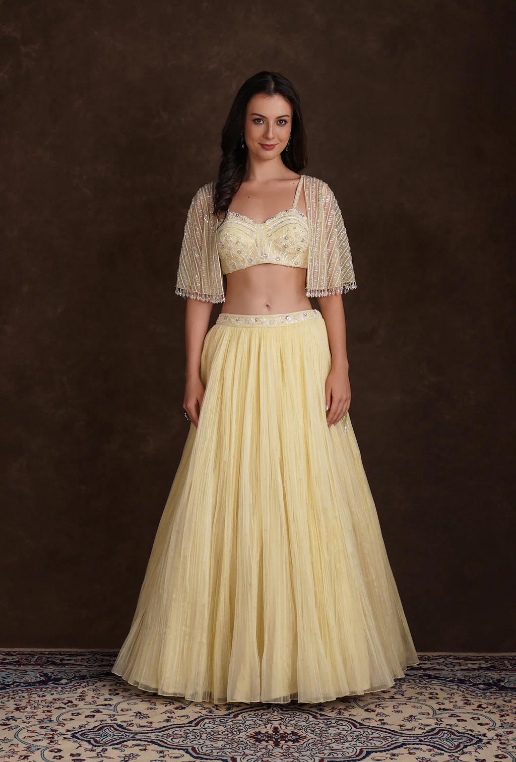 Estelle Yellow Lehenga with Sequined Blouse & Net Cape