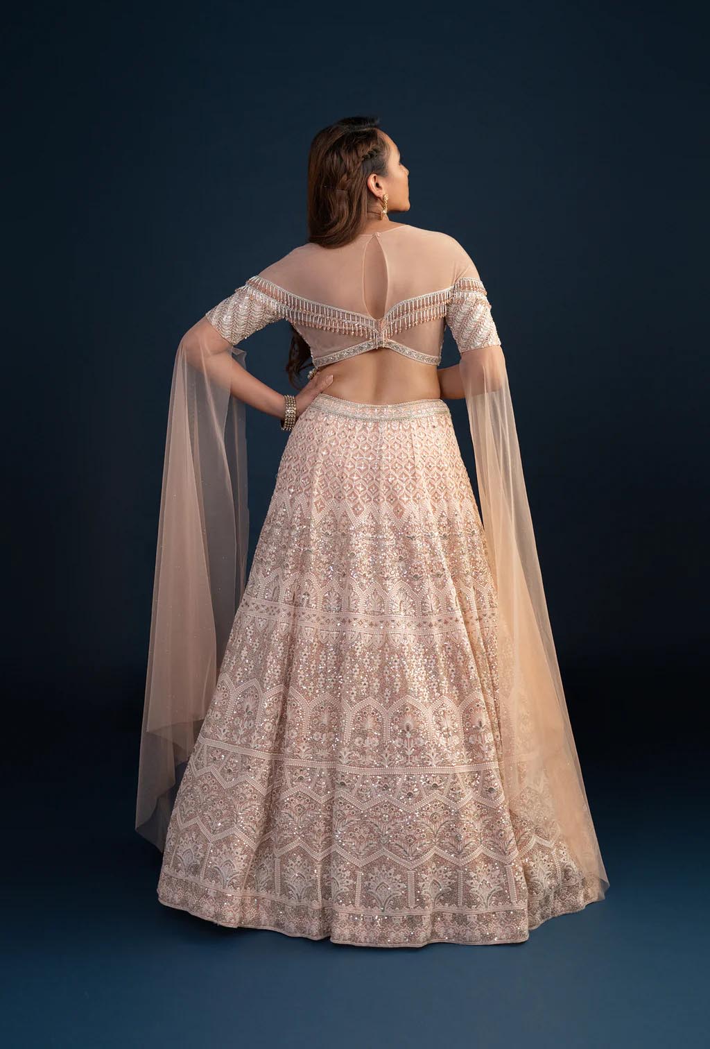 Elysian Peach Two Piece Lehenga Set with Resham & Sequins Work Cape