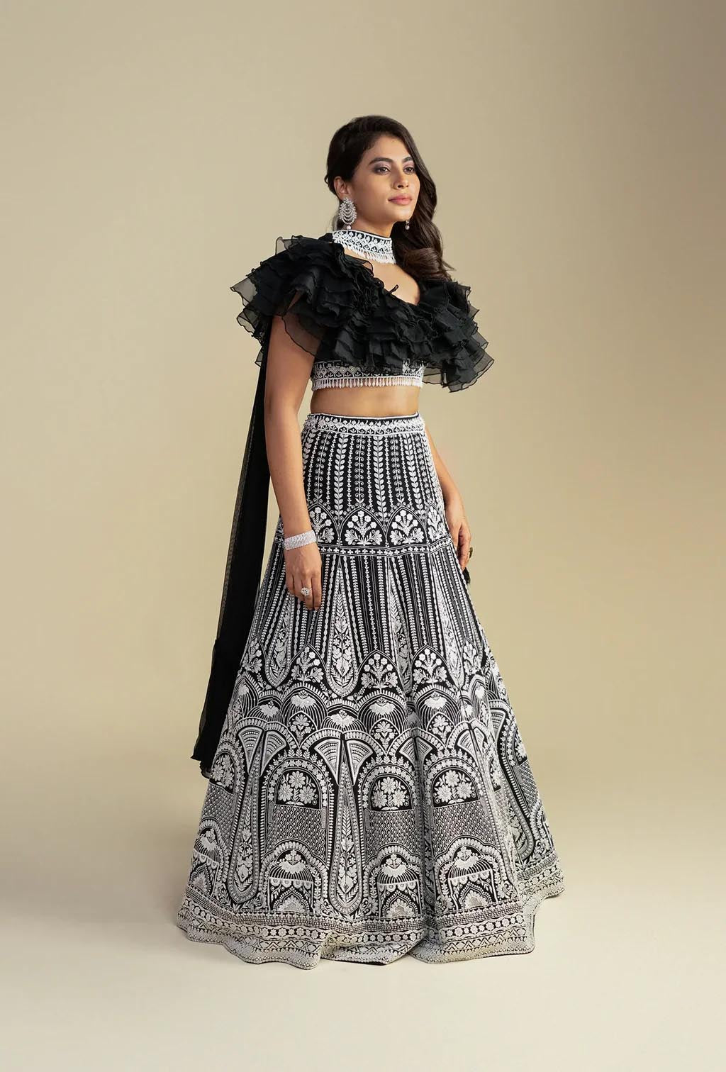 Regalia Black Ruffled Blouse with Chikankari Handwork Lehenga & Choker Dupatta