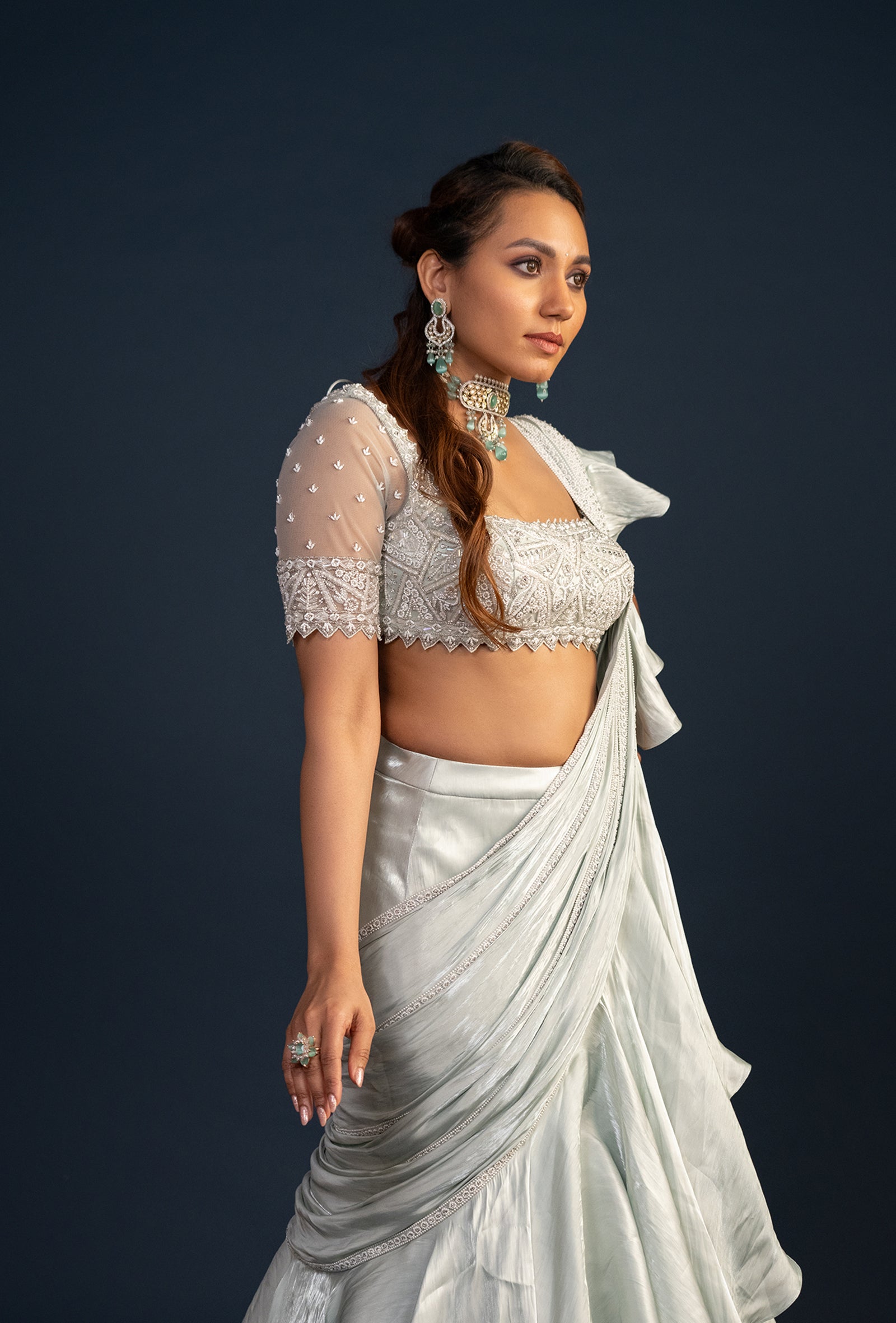 Demure Milky Green with Ruffled Gabana Silk draped dupatta Lehenga Set