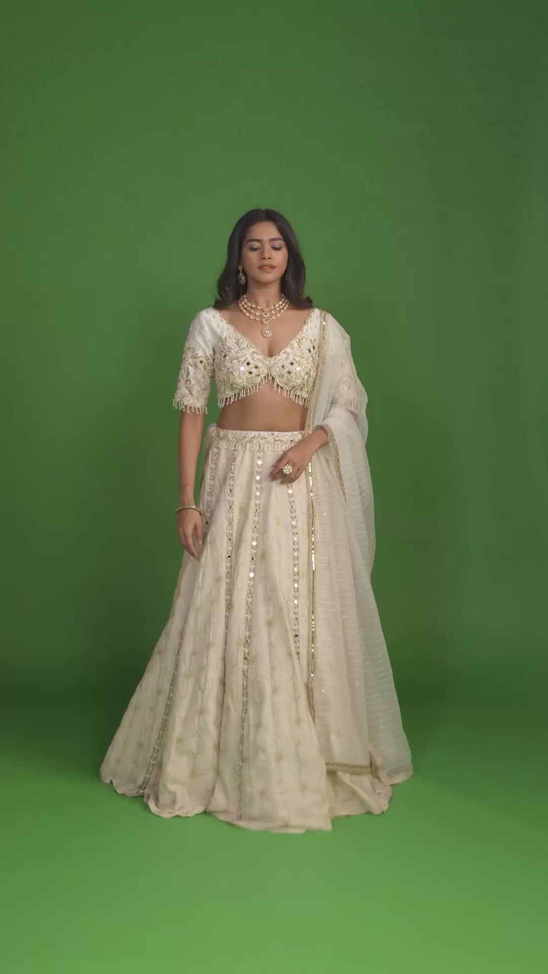 Astral Ivory Mirror Work Plunging Neck Lehenga Set