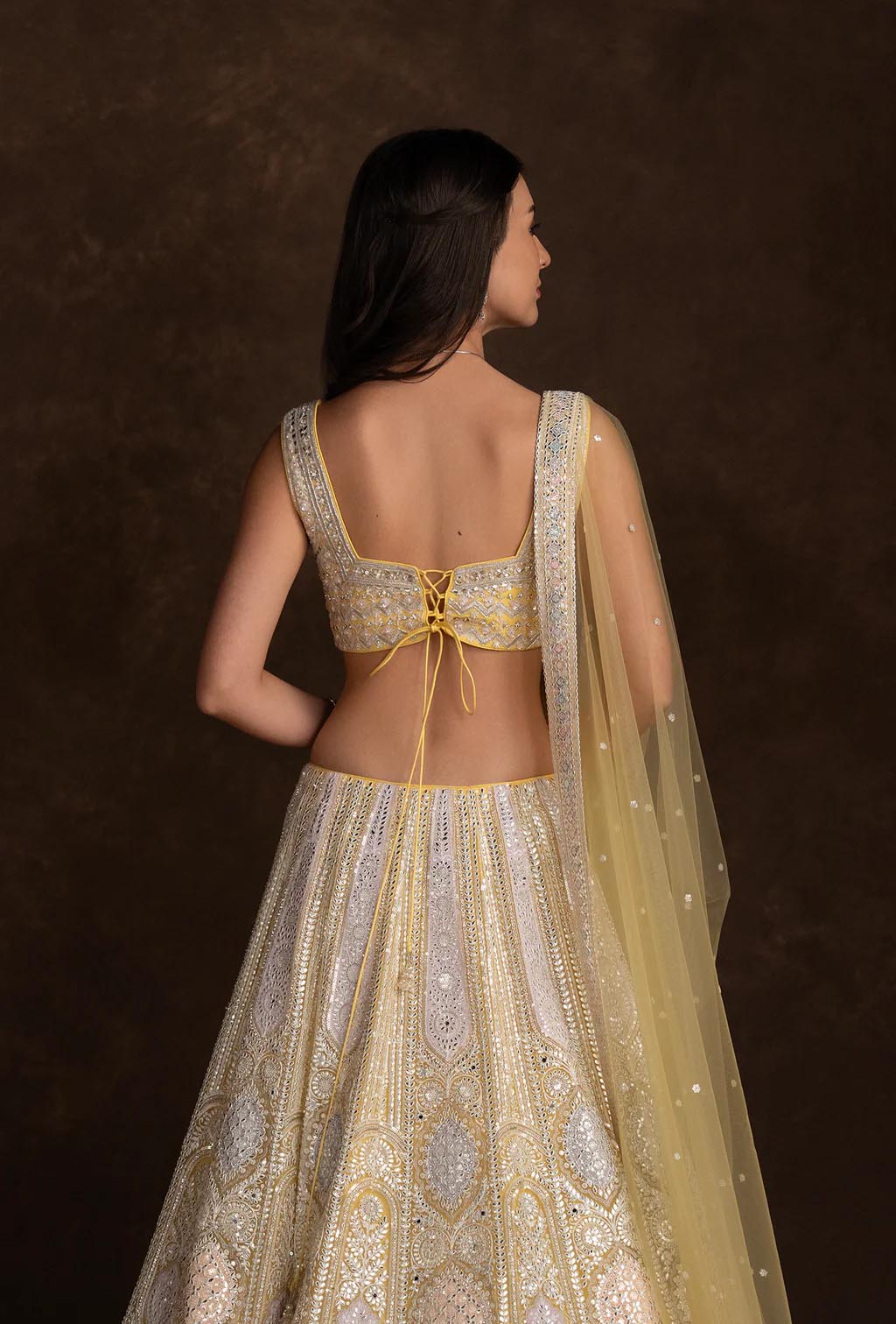 Asmira Bright Yellow Sequins and Stonework Lehenga Set