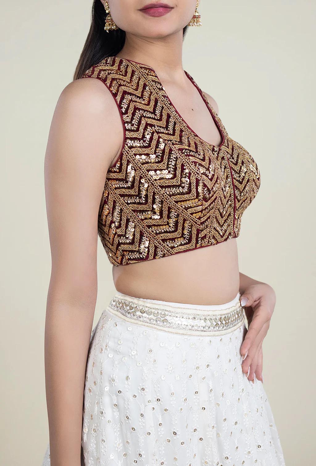 Maroon With Gold Sequence Embroidered Sleeveless Blouse