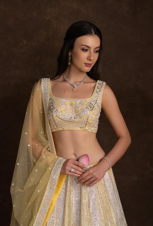 Asmira Bright Yellow Sequins and Stonework Lehenga Set