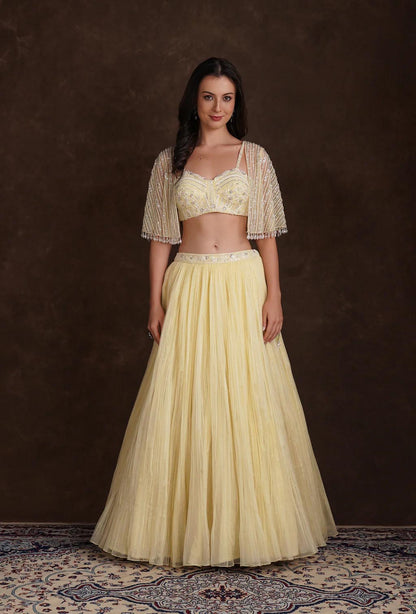 Estelle Yellow Lehenga with Sequined Blouse & Net Cape