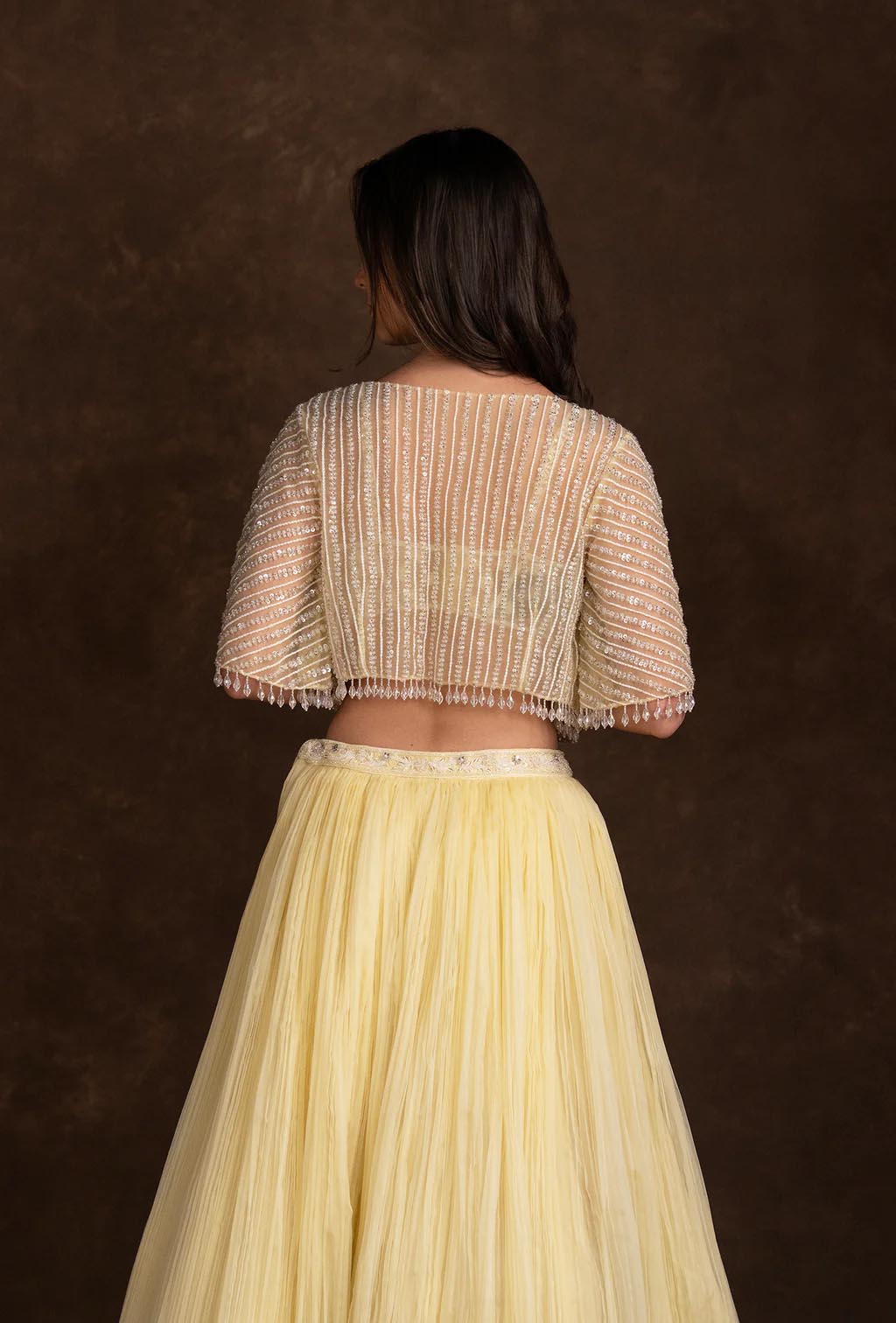 Estelle Yellow Lehenga with Sequined Blouse & Net Cape