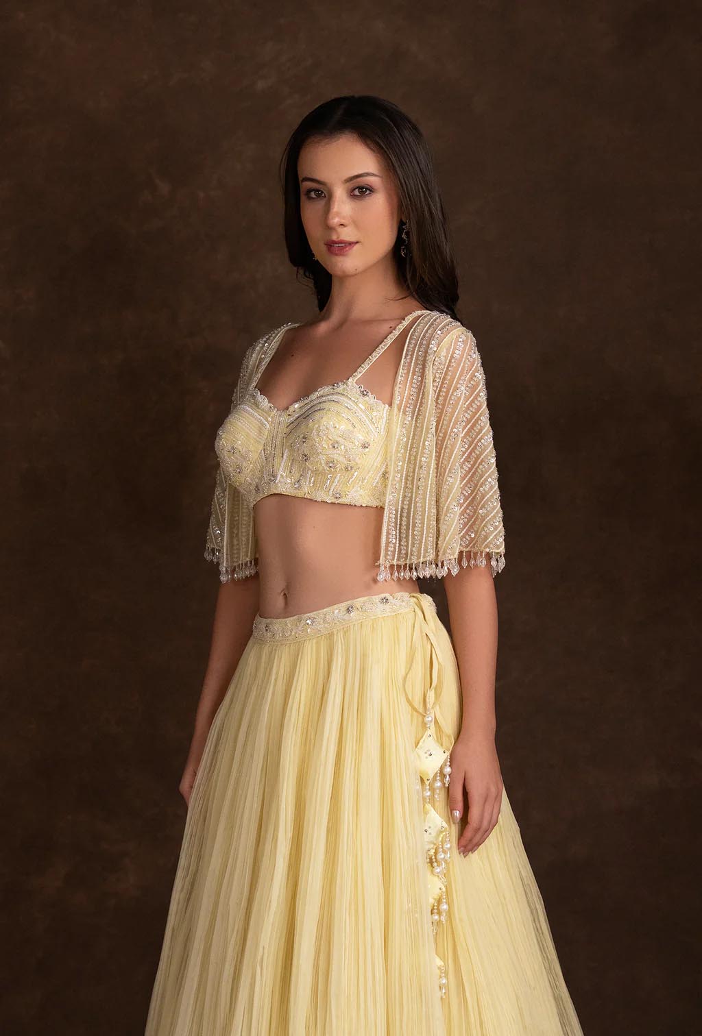 Estelle Yellow Lehenga with Sequined Blouse & Net Cape