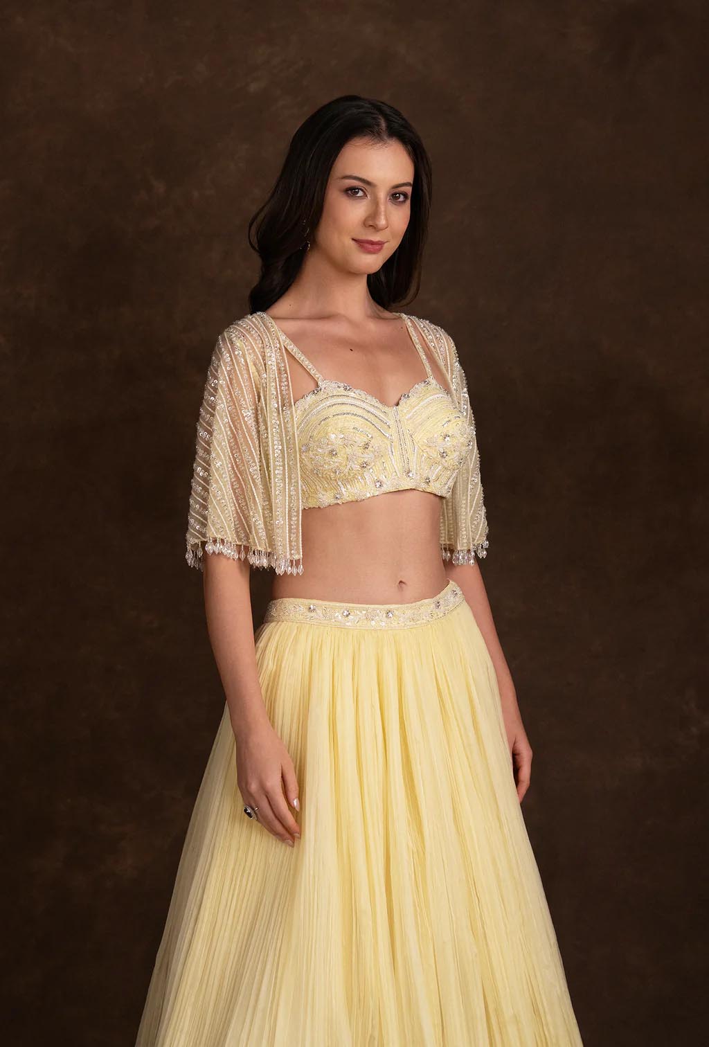 Estelle Yellow Lehenga with Sequined Blouse & Net Cape