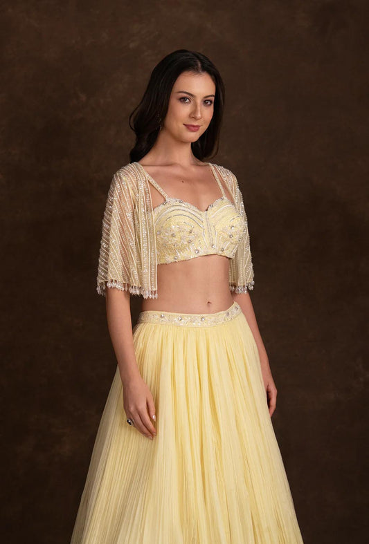 Estelle Yellow Lehenga with Sequined Blouse & Net Cape