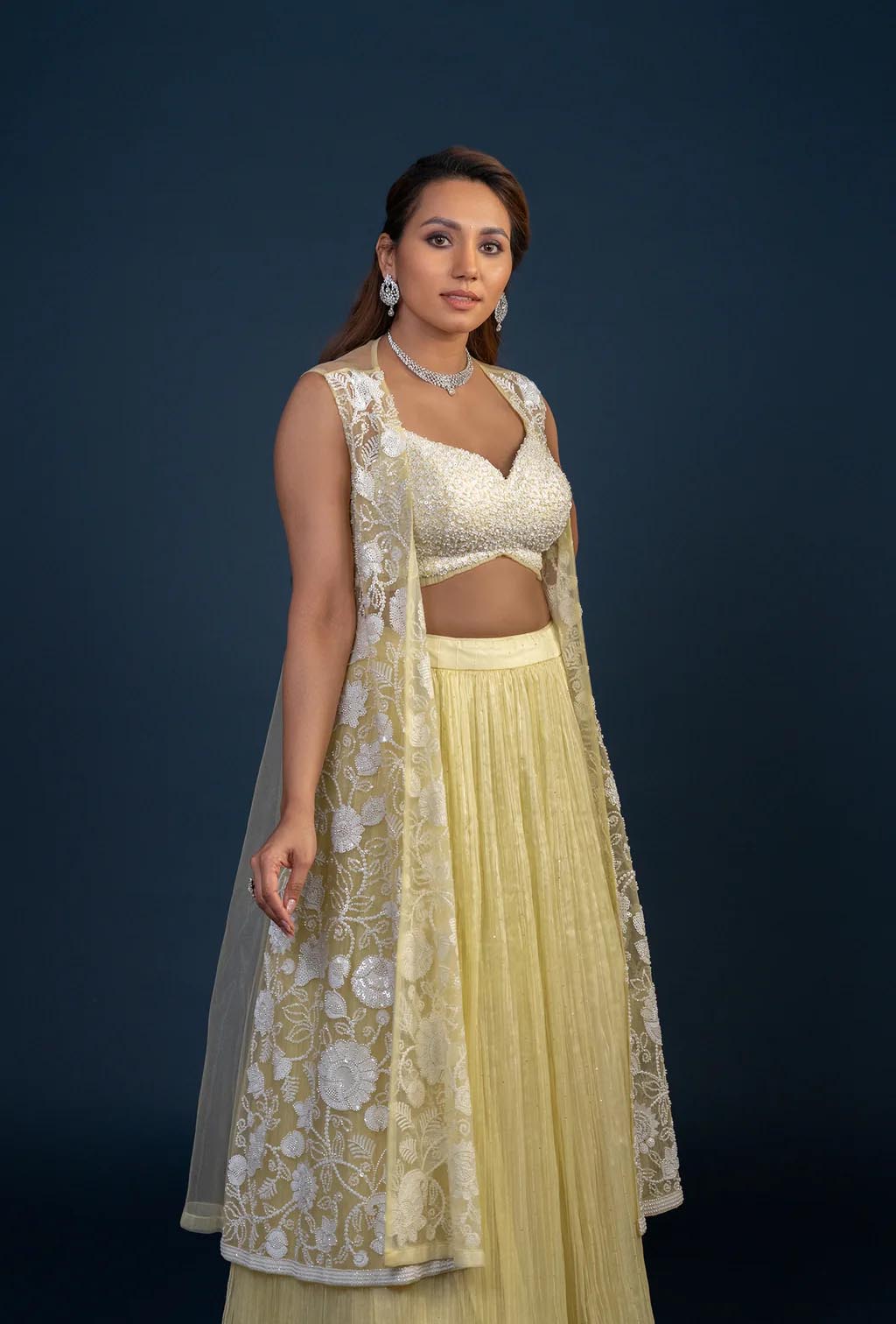 Irene Three piece Pastel Yellow Embroidered Lehenga Set