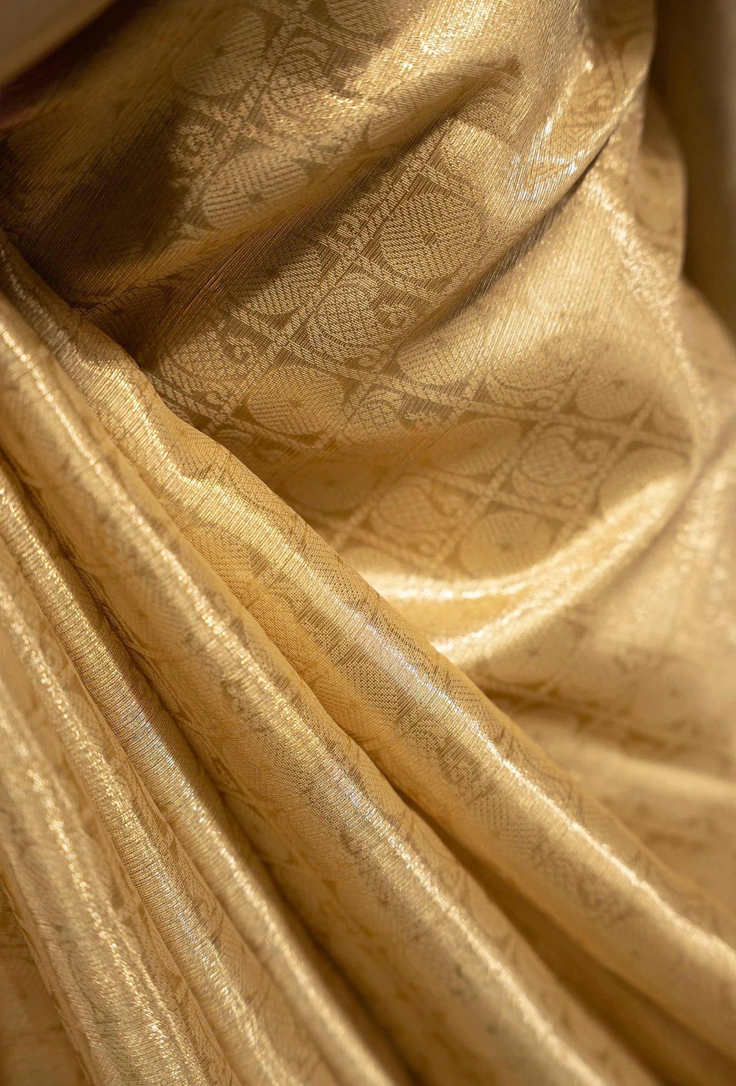 Tissue Silk Saree In Golden And Pink With Paisley Motifs