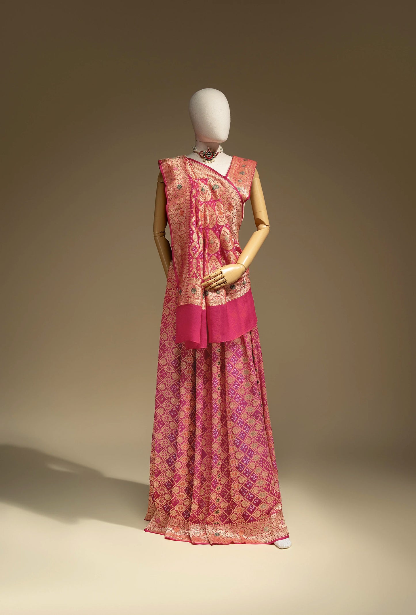 Bandhani Saree In Rani Pink With Tilfi & Gyasar Work