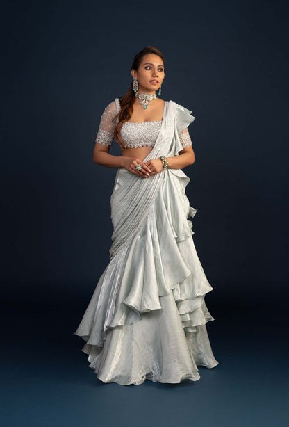 Demure Milky Green with Ruffled Gabana Silk draped dupatta Lehenga Set