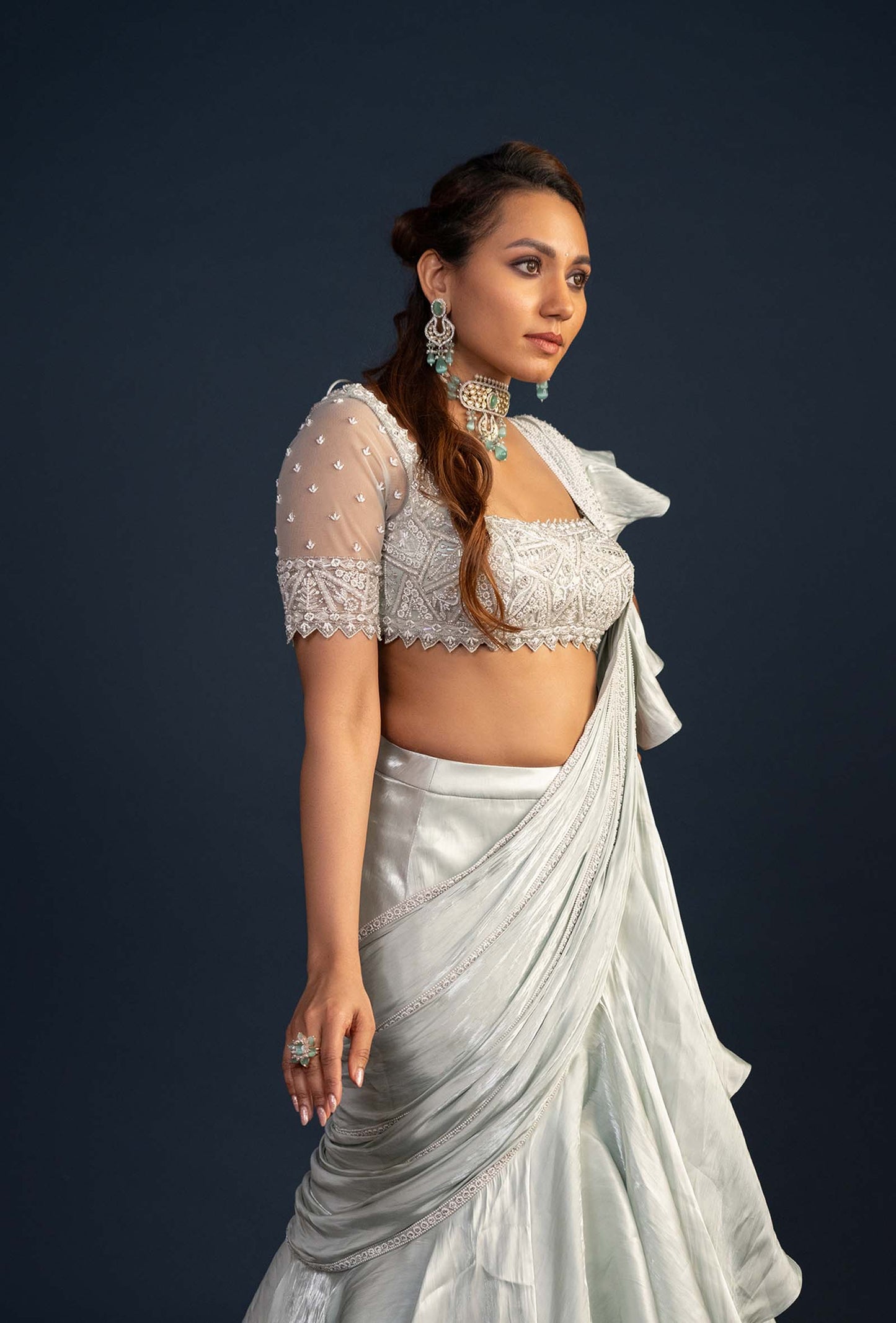 Demure Milky Green with Ruffled Gabana Silk draped dupatta Lehenga Set