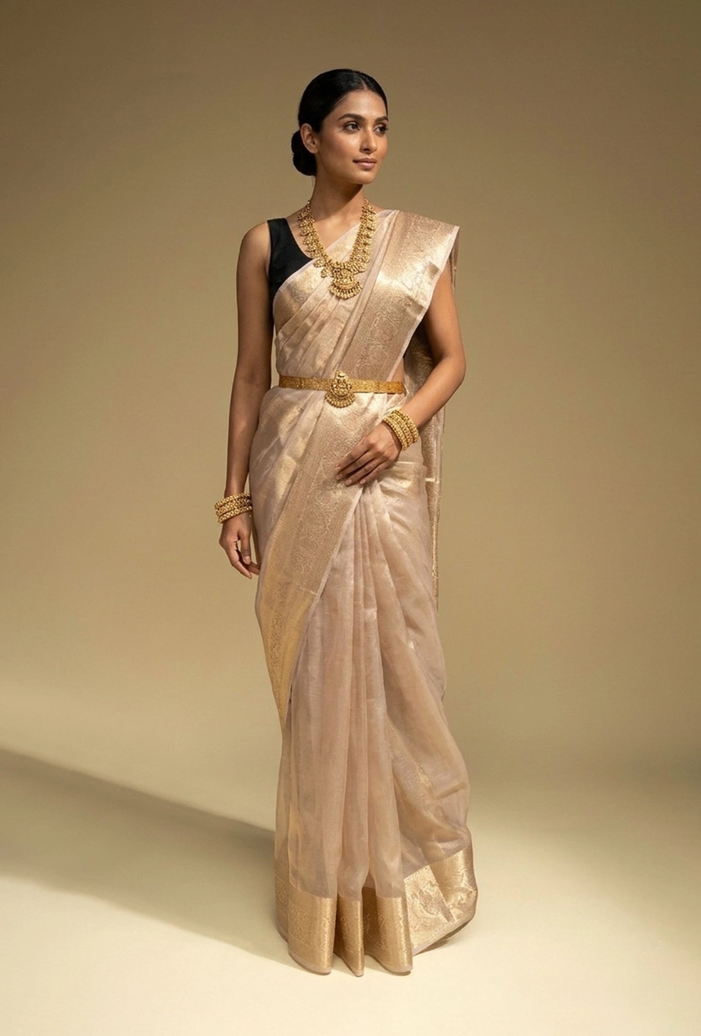 Pure Shimmer Tissue Saree In Golden For Luxe Occasions