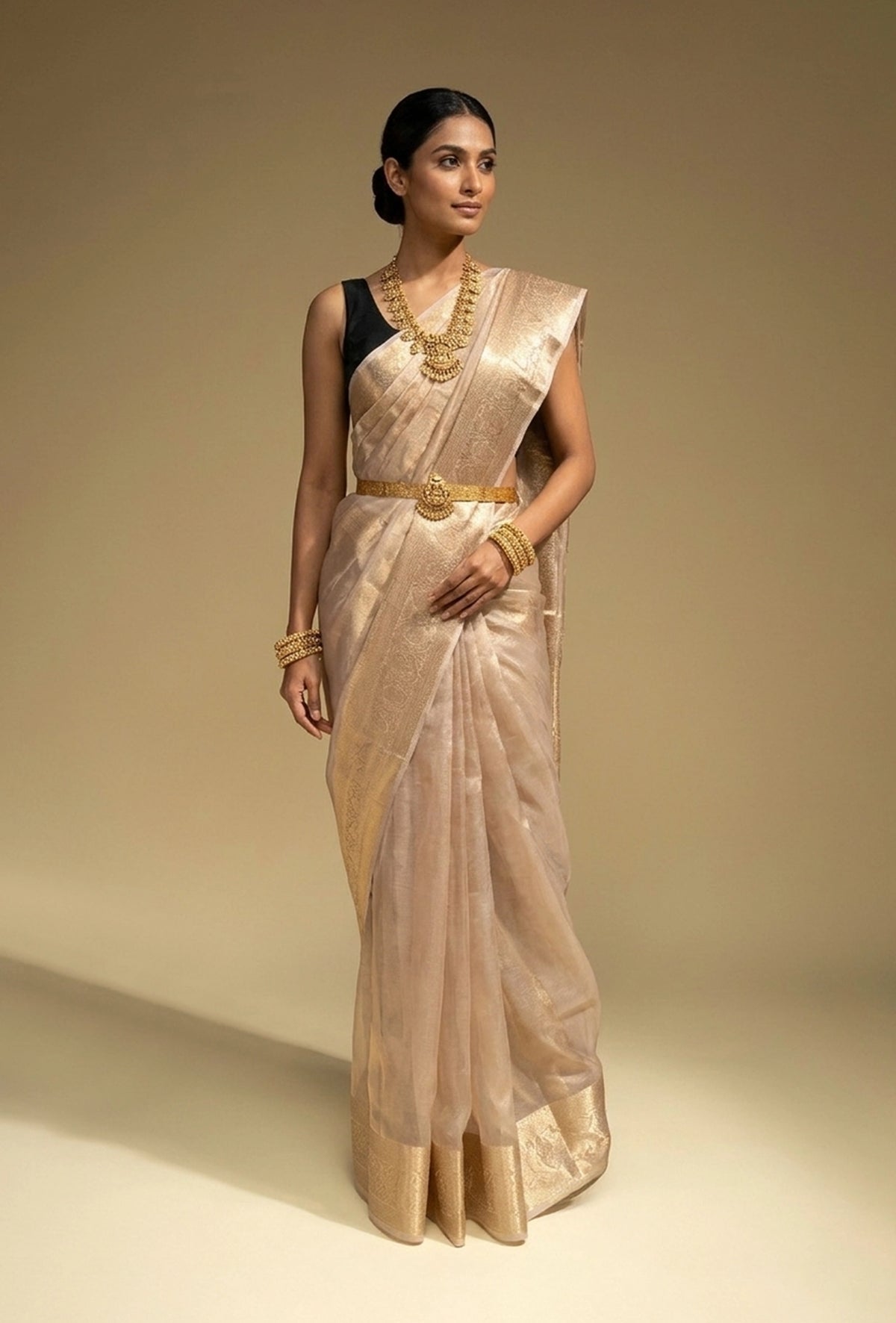 Pure Shimmer Tissue Saree In Golden For Luxe Occasions