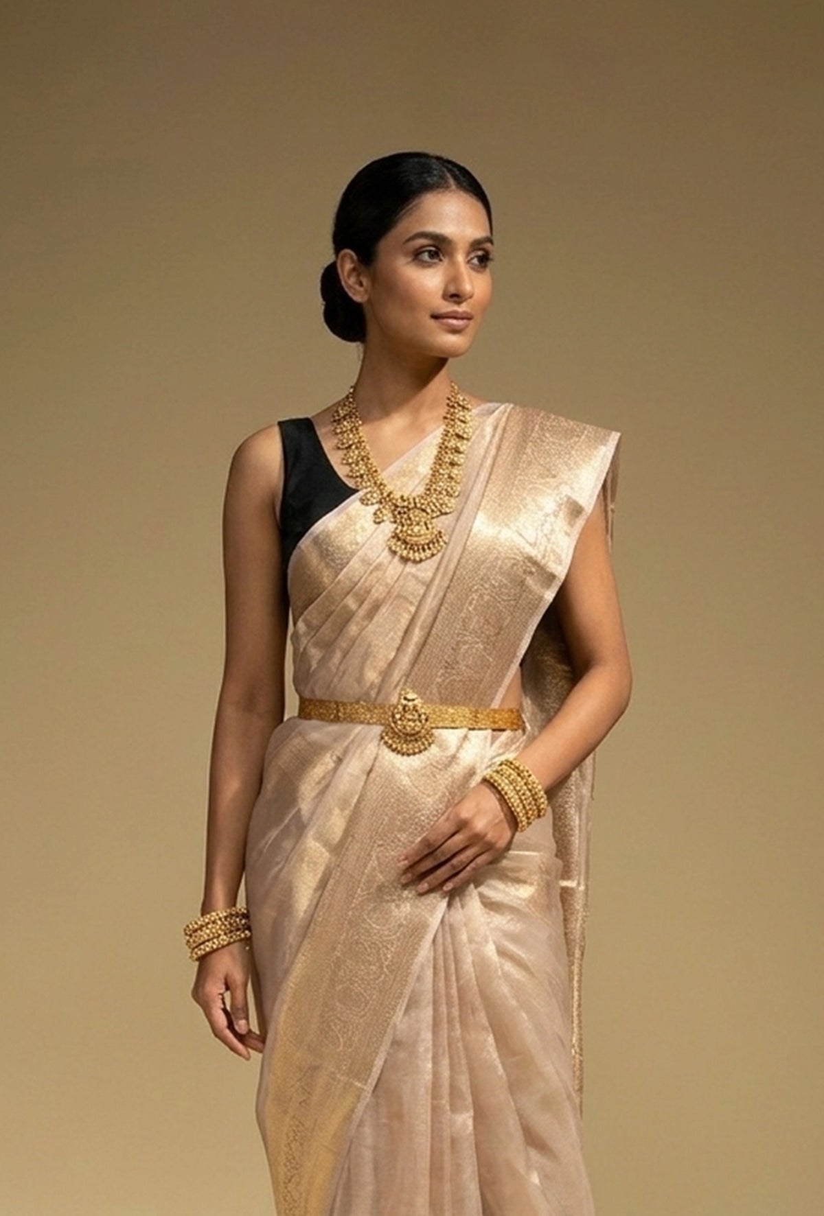Pure Shimmer Tissue Saree In Golden For Luxe Occasions