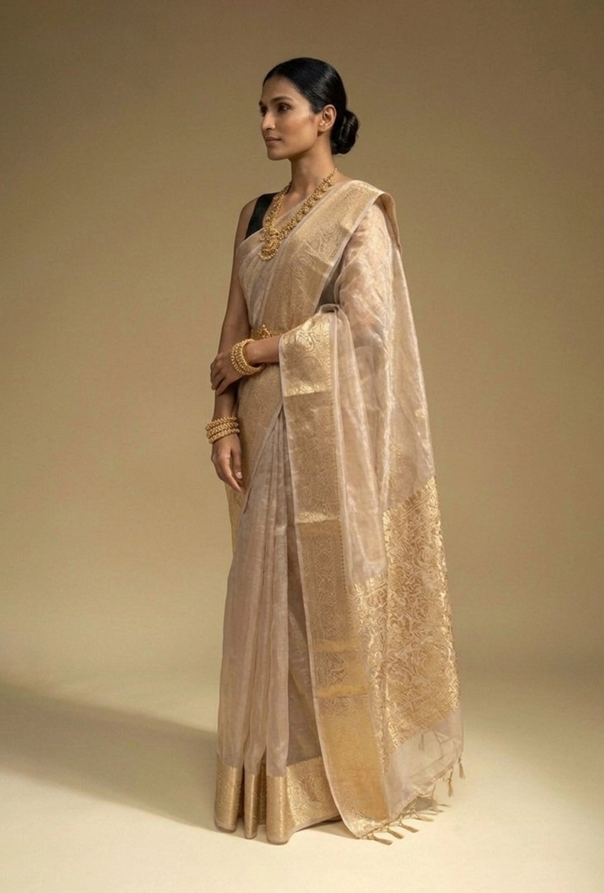 Pure Shimmer Tissue Saree In Golden For Luxe Occasions