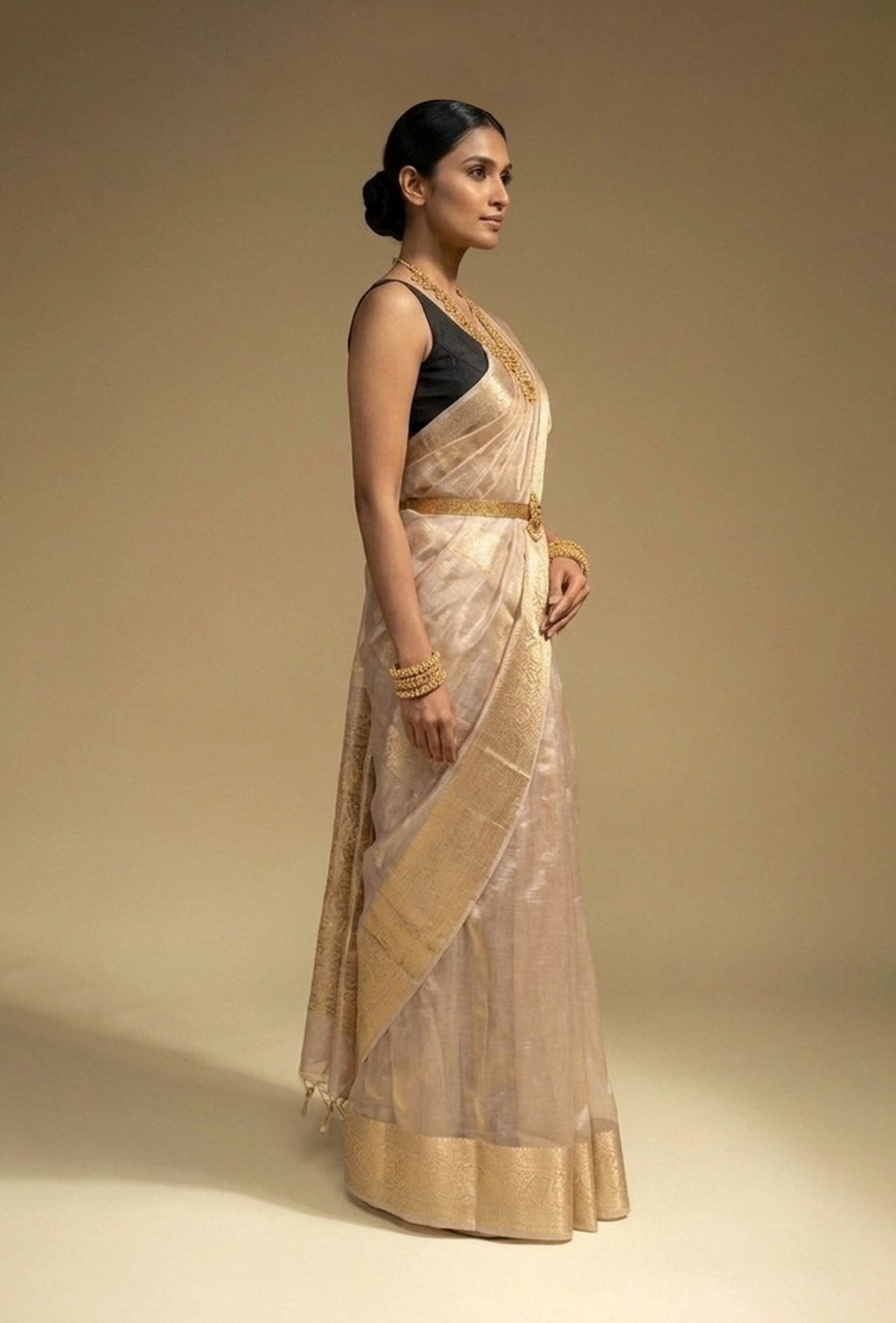 Pure Shimmer Tissue Saree In Golden For Luxe Occasions