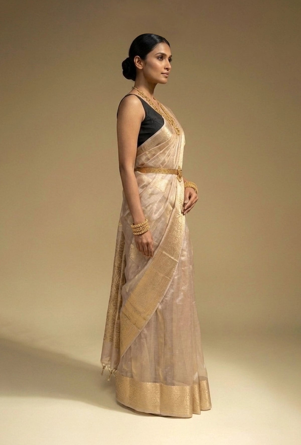 Pure Shimmer Tissue Saree In Golden For Luxe Occasions