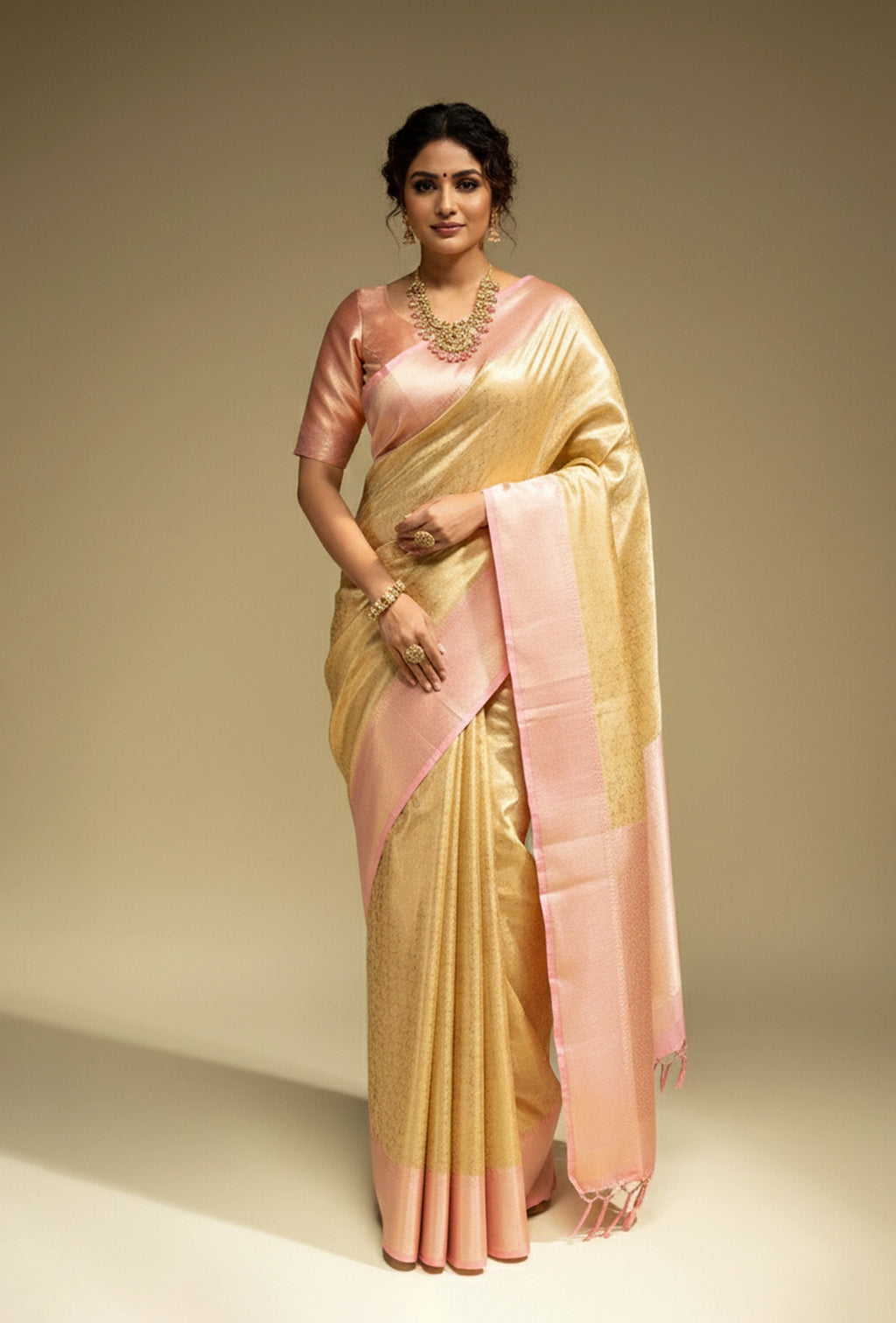 Tissue Silk Saree In Golden And Pink With Paisley Motifs