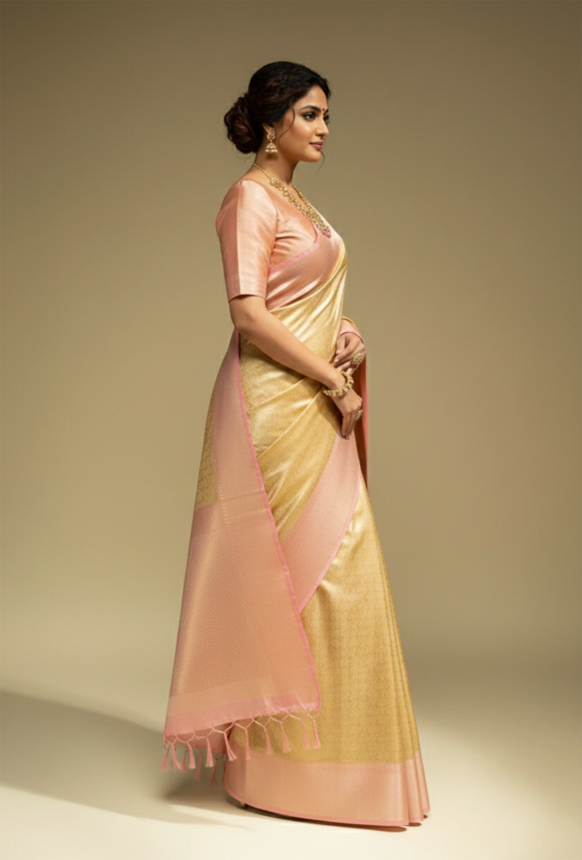 Tissue Silk Saree In Golden And Pink With Paisley Motifs