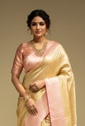 Tissue Silk Saree In Golden And Pink With Paisley Motifs