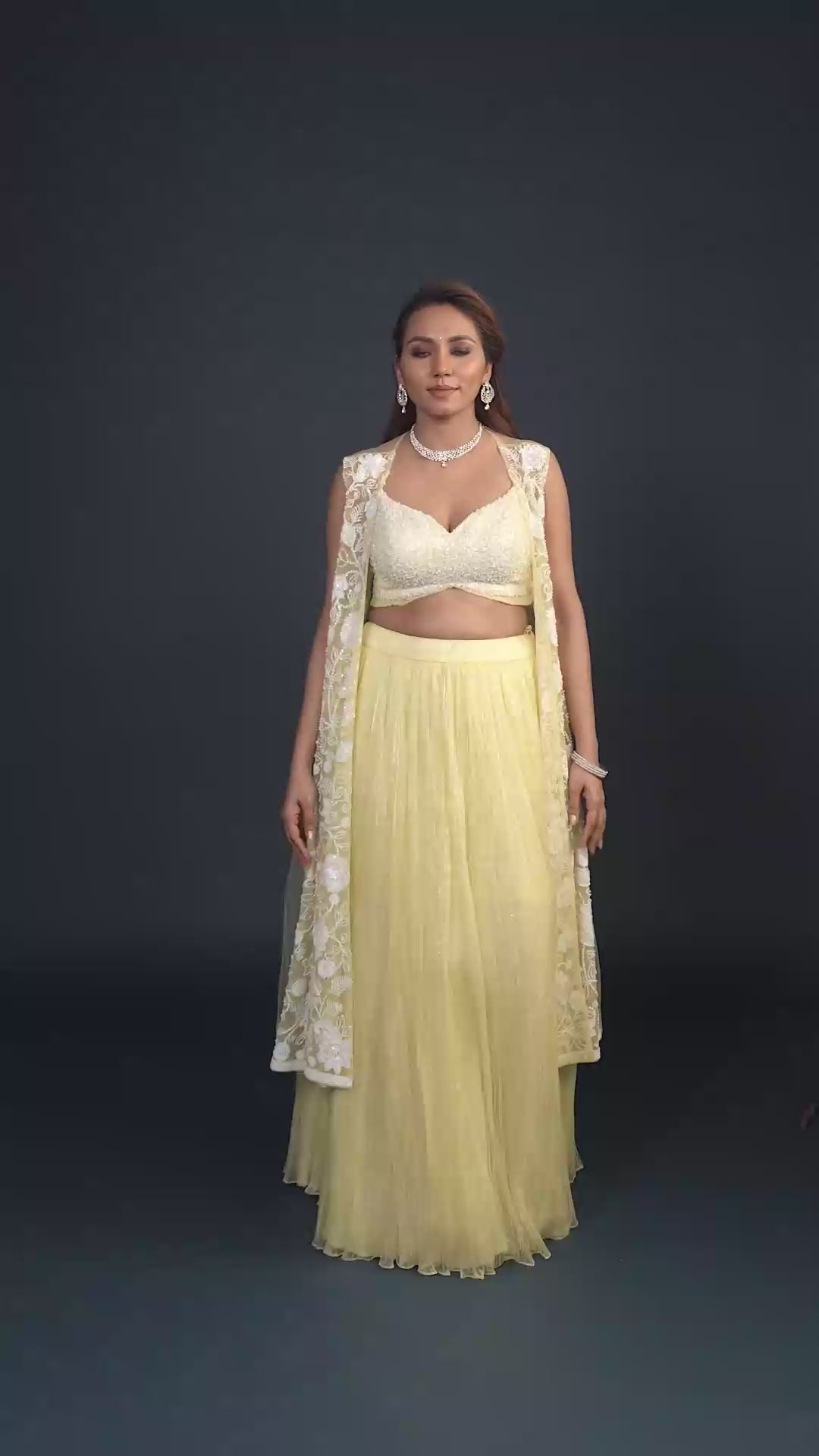 Irene Three piece Pastel Yellow Embroidered Lehenga Set