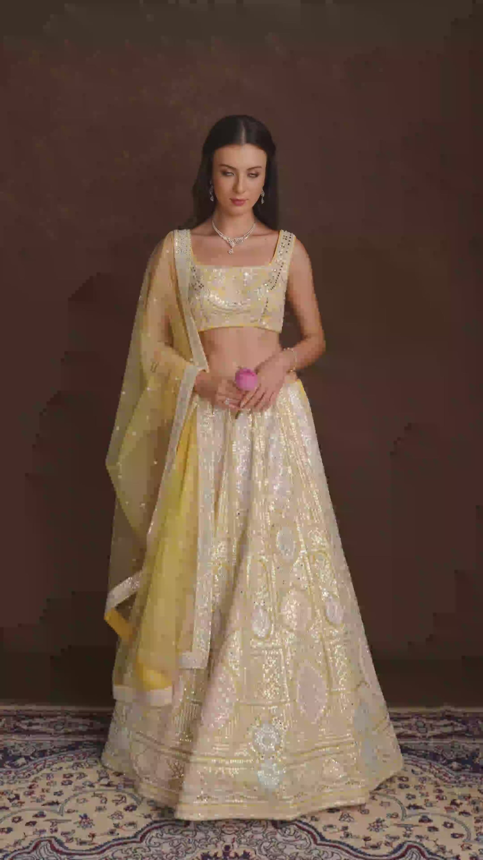 Asmira Bright Yellow Sequins and Stonework Lehenga Set