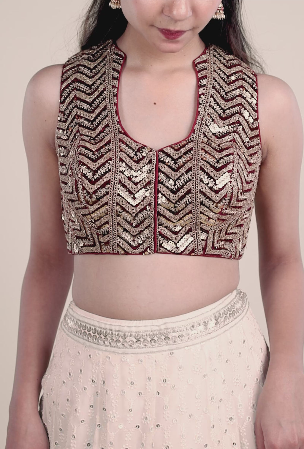 Maroon With Gold Sequence Embroidered Sleeveless Blouse