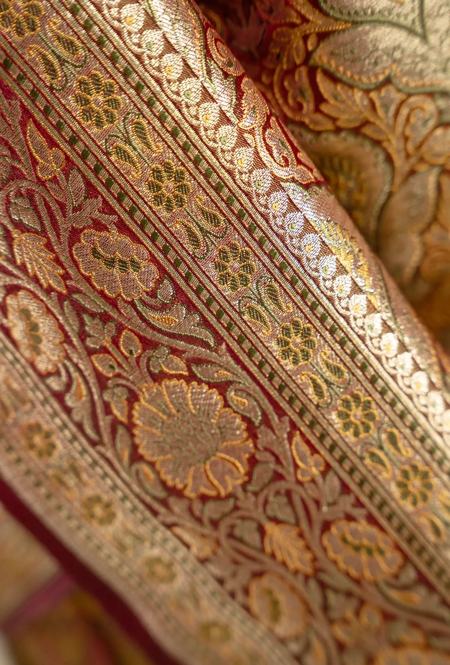 Patola Saree In Wine Brown With Exquisite Floral Work