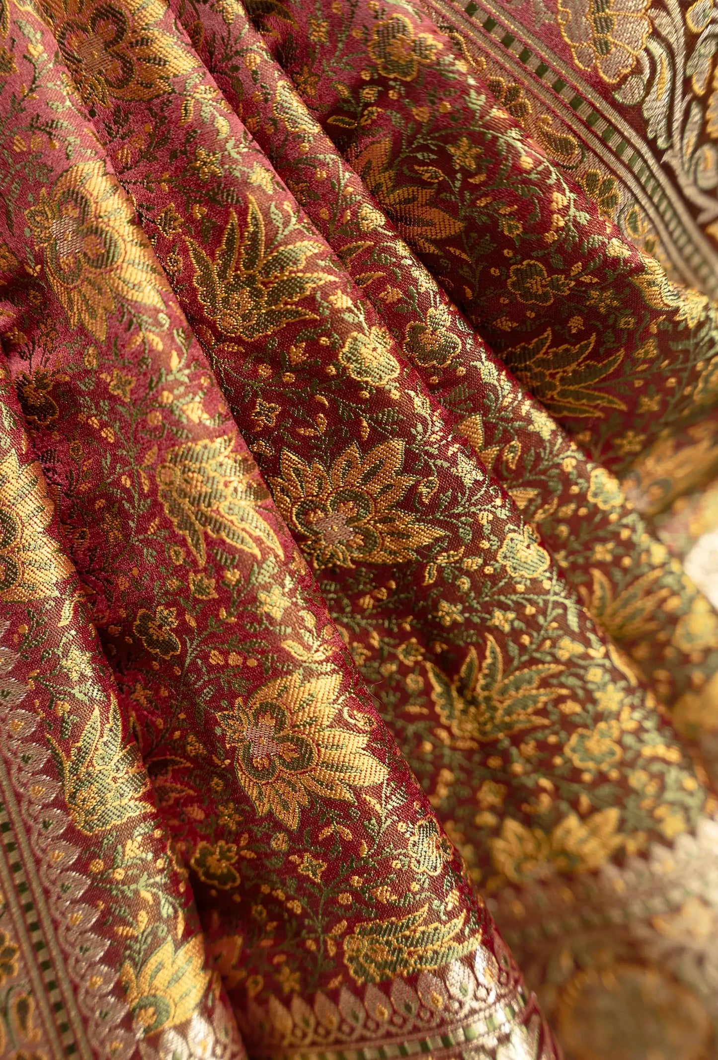 Patola Saree In Wine Brown With Exquisite Floral Work