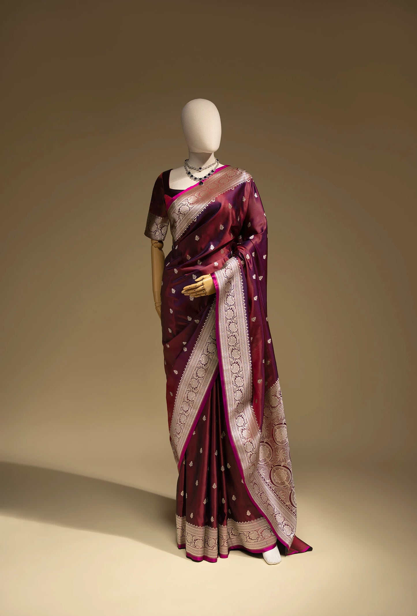 Malai Silk Saree In Deep Wine With Zari Buttiwork Embellishments