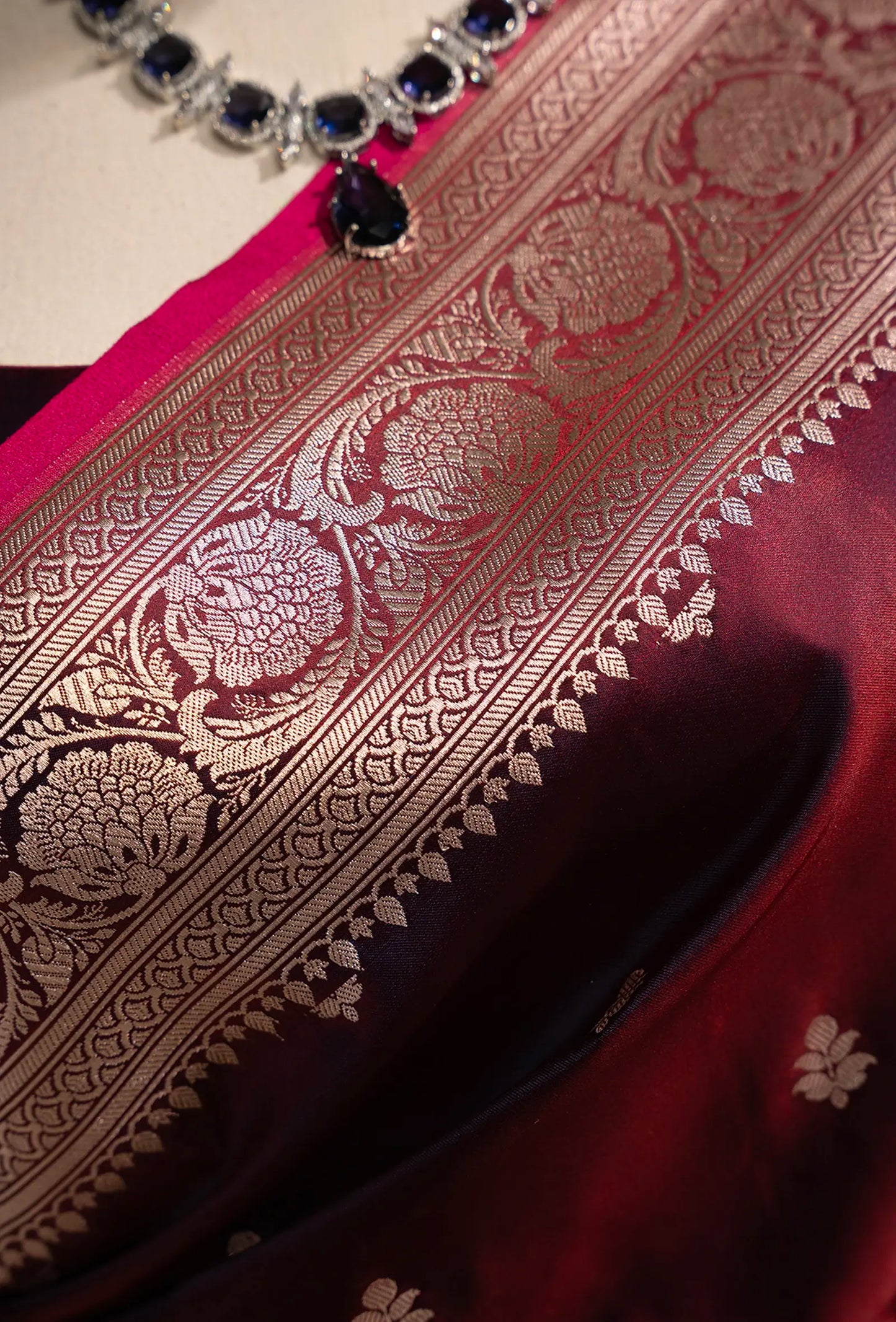 Malai Silk Saree In Deep Wine With Zari Buttiwork Embellishments
